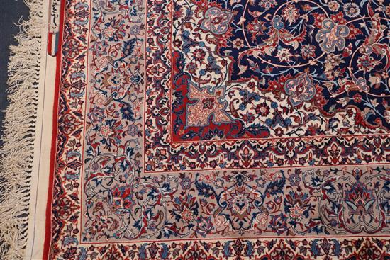 A fine Tabriz blue ground rug, 7ft 10in by 4ft 10in.